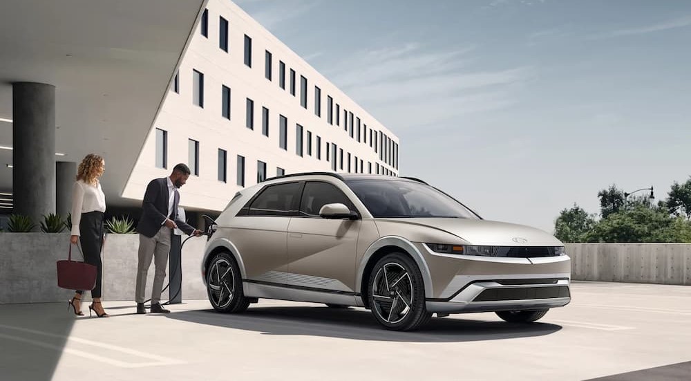 A multi-colored 2025 Hyundai IONIQ 5 for sale is charging.