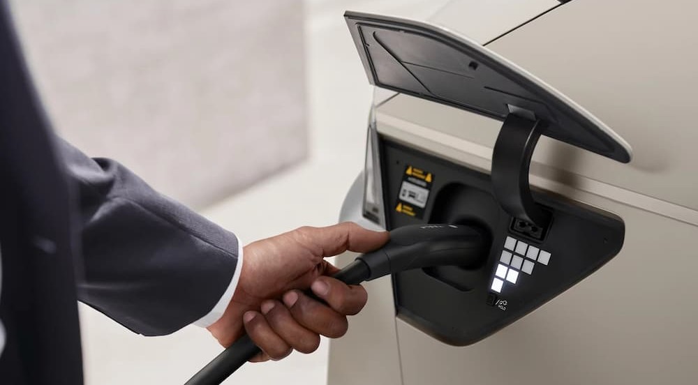 The charge-port on a tan 2025 Hyundai IONIQ 5.