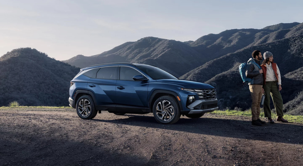 Blue 2026 Hyundai Tuscon parked in the mountains