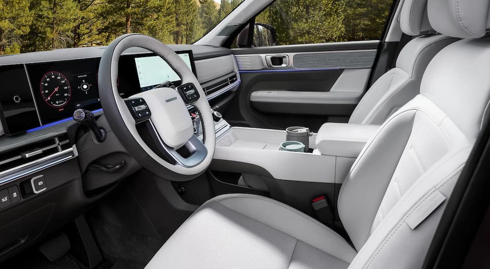 Light grey front seating and dashboard in a 2026 Hyundai Santa Fe