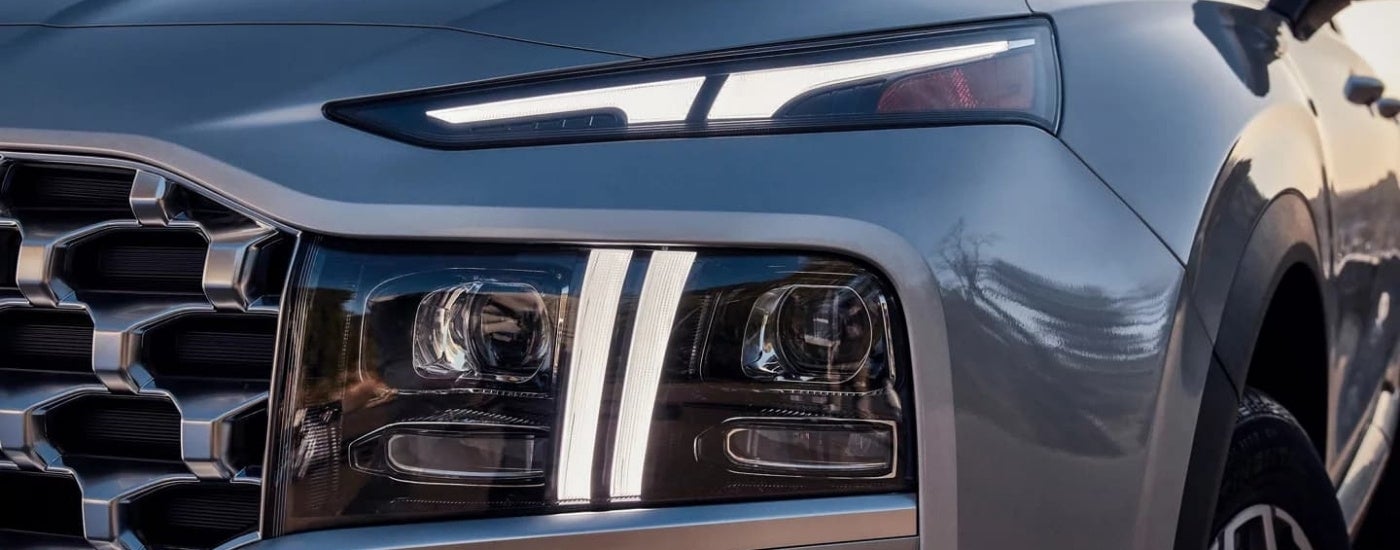 Driver side headlight on a silver 2023 Hyundai Santa Fe PHEV