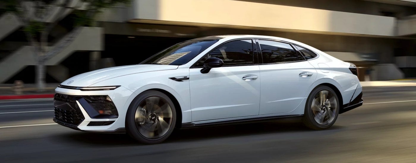A white 2025 Hyundai Sonata from the side after leaving a Hyundai dealer near Mundelein..