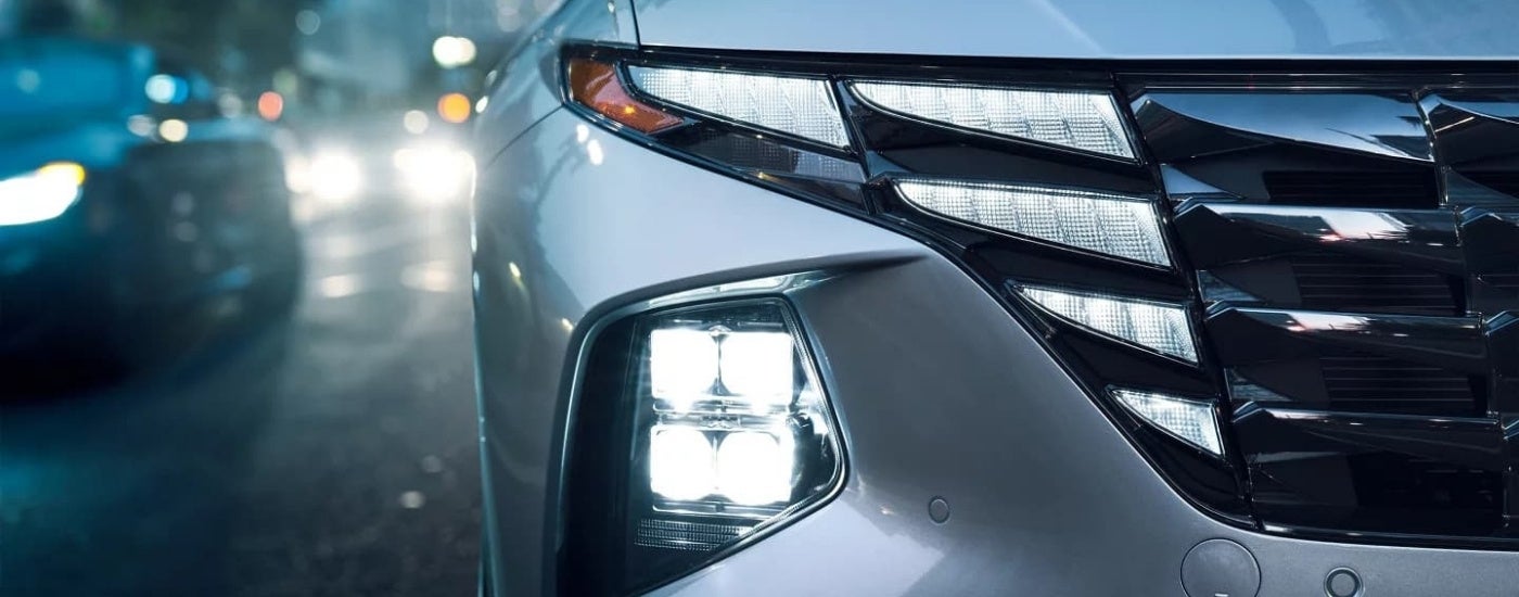 Headlight and foglight on a silver 2023 Hyundai Tucson.