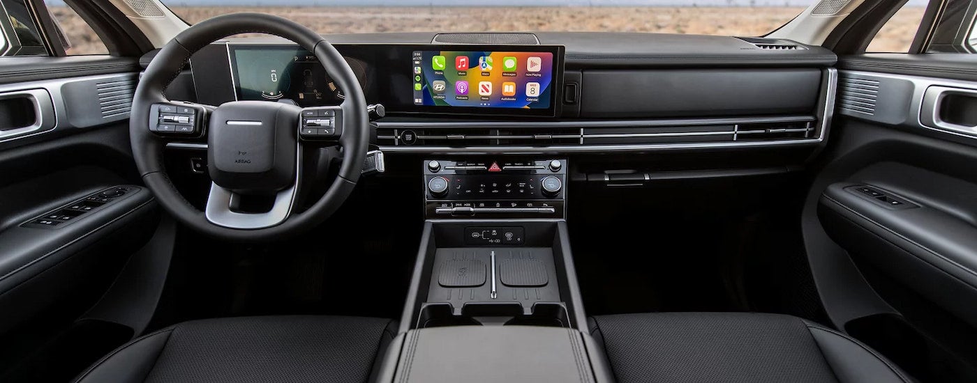 The cabin of a 2024 Hyundai Santa Fe for sale.