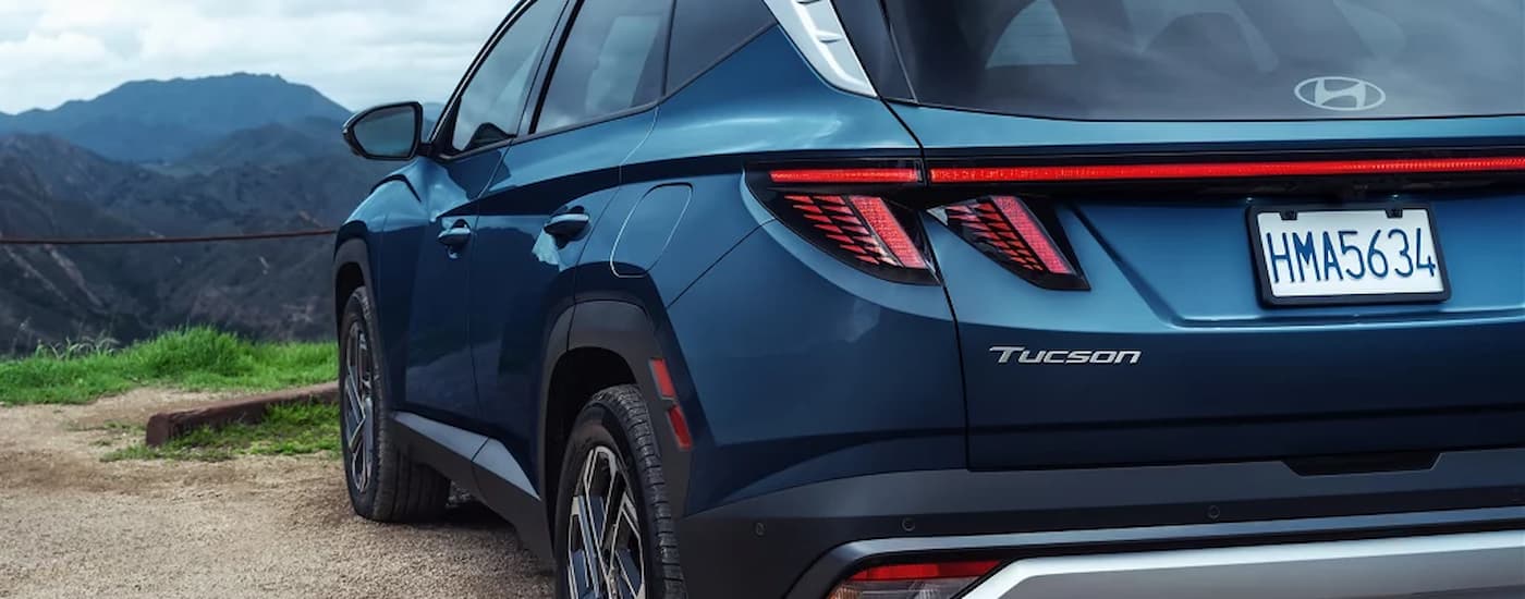 Rear of a blue 2026 Hyundai Tucson for sale near Libertyville