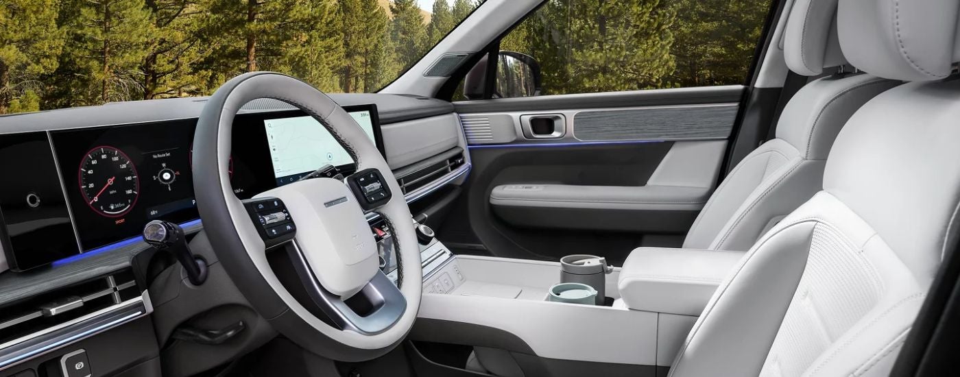 White and gray interior of a 2026 Hyundai Santa Fe.